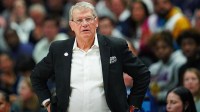 UConn women's basketball head coach Geno Auriemma watches from the sideline as they take on the South Dakota State Jackrabbits at Harry A. Gampel Pavilion.