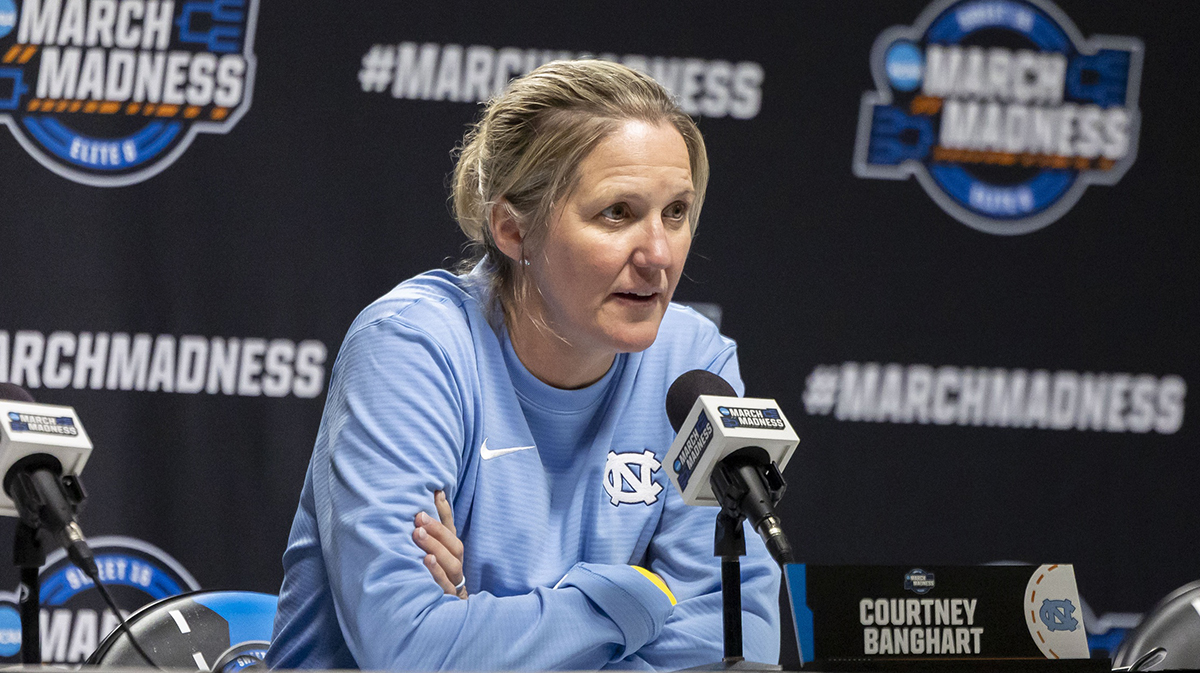 UNC Tar Heels head coach Courtney Banghart talks with the media before her team works out during practice day.