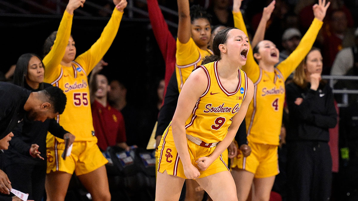 USC Trojans guard Kayleigh Heckel (9) lets out a yell after hitting a 3-point basket during the third quarter of an NCAA Tournament second round game at Galen Center.
