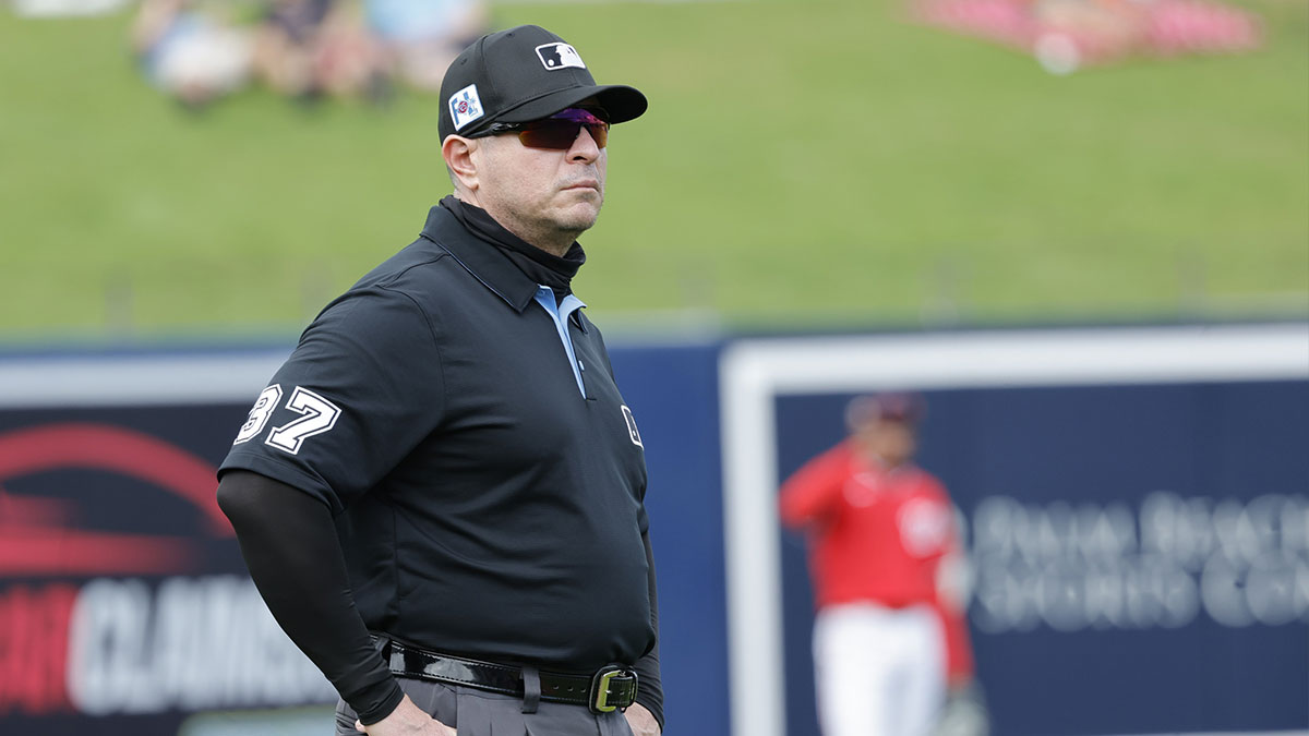 Umpire Carlos Torres (37) looks at home plate during the seventh inning between the Washington Nationals and the Houston Astros at CACTI Park of the Palm Beaches. 