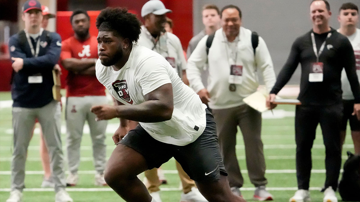 Mar 19, 2025; Tuscaloosa AL, USA; Offensive lineman Tyler Booker rusn a drill for scouts at the University of Alabama Pro Day as several Crimson Tide players worked out for NFL teams in the Hank Crisp Indoor Practice Facility.