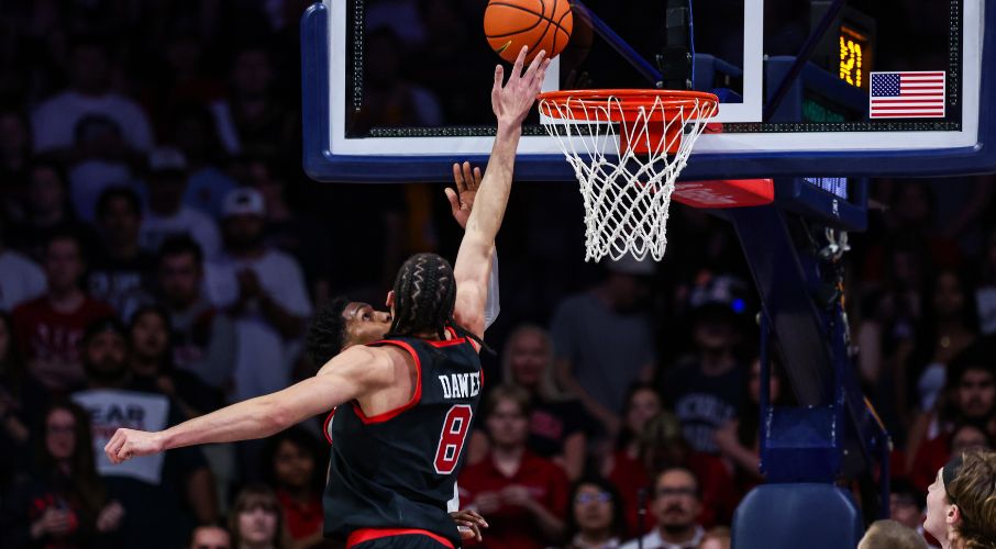 Utah Utes college basketball transfer portal forward Keanu Dawes (8) blocks a lay up made by Arizona Wildcats guard Caleb Love (1) during the first half at McKale Center.