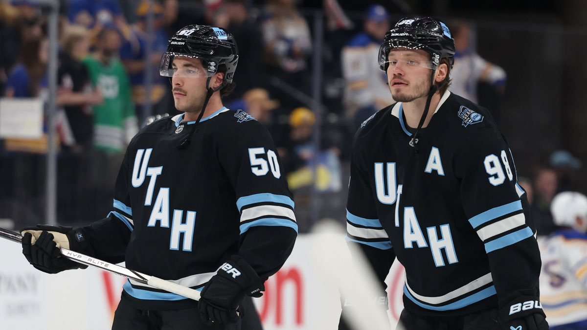 Utah Hockey Club defenseman Sean Durzi (50) and defenseman Mikhail Sergachev (98) warm up before the game against the Buffalo Sabres at Delta Center.