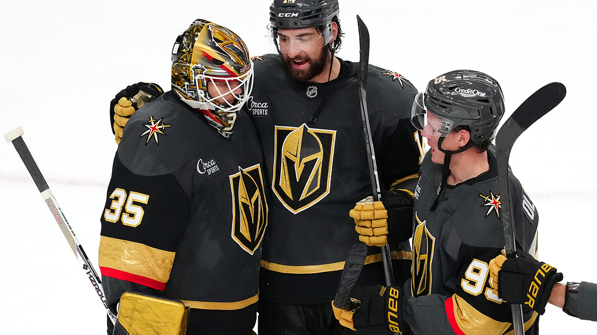 Vegas Golden Knights goaltender Ilya Samsonov (35) is congratulated by defenseman Nicolas Hague (14) and right wing Victor Olofsson (95) after defeating the Tampa Bay Lightning 4-2 at T-Mobile Arena.