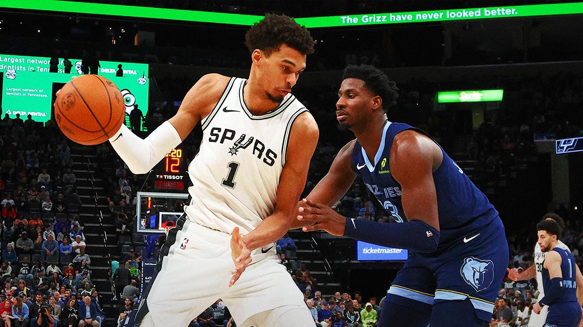 San Antonio Spurs Center Victor Vigbaniama (1) Drive to Cart as Memphis Grizzlies Next Jaren Jackson Jr. (13) Defend during the third quarter in FedExforum. 