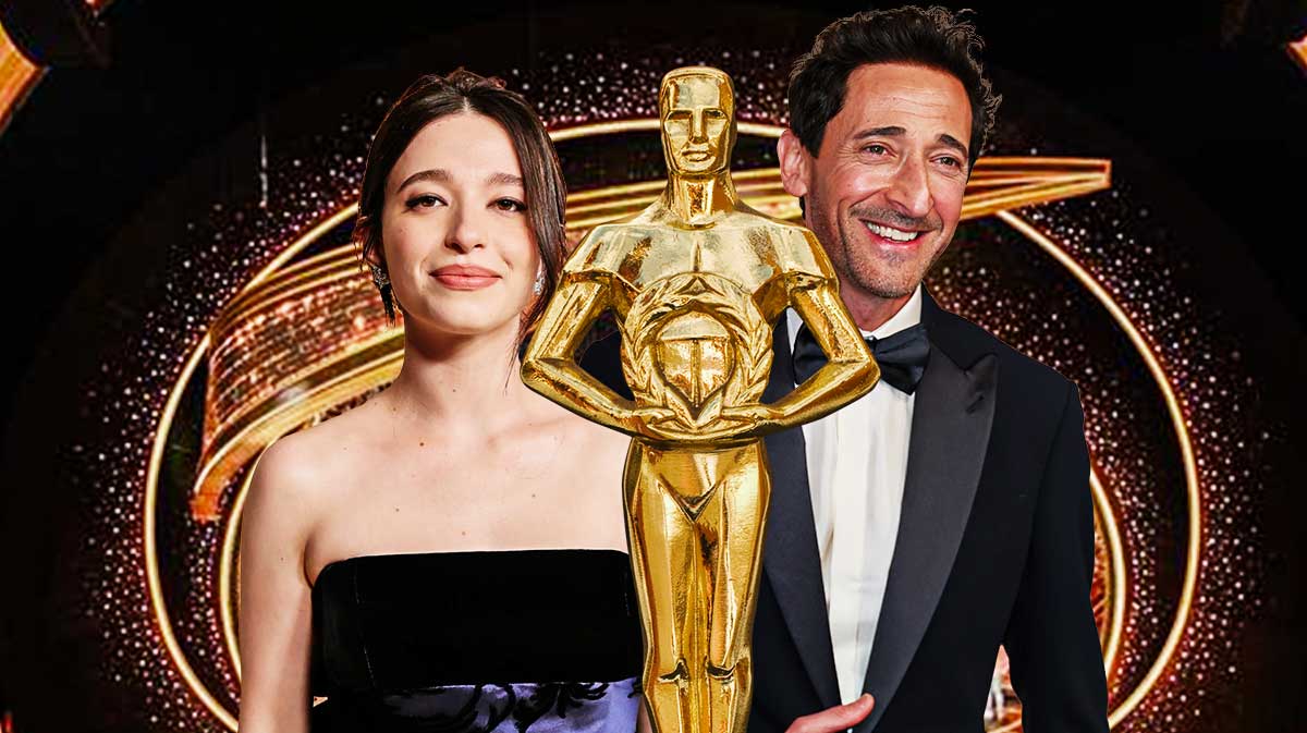 2025 Oscars winners Mikey Madison (Best Actress) and Adrien Brody (Best Actor) with Academy Award of Merit trophy in between them.