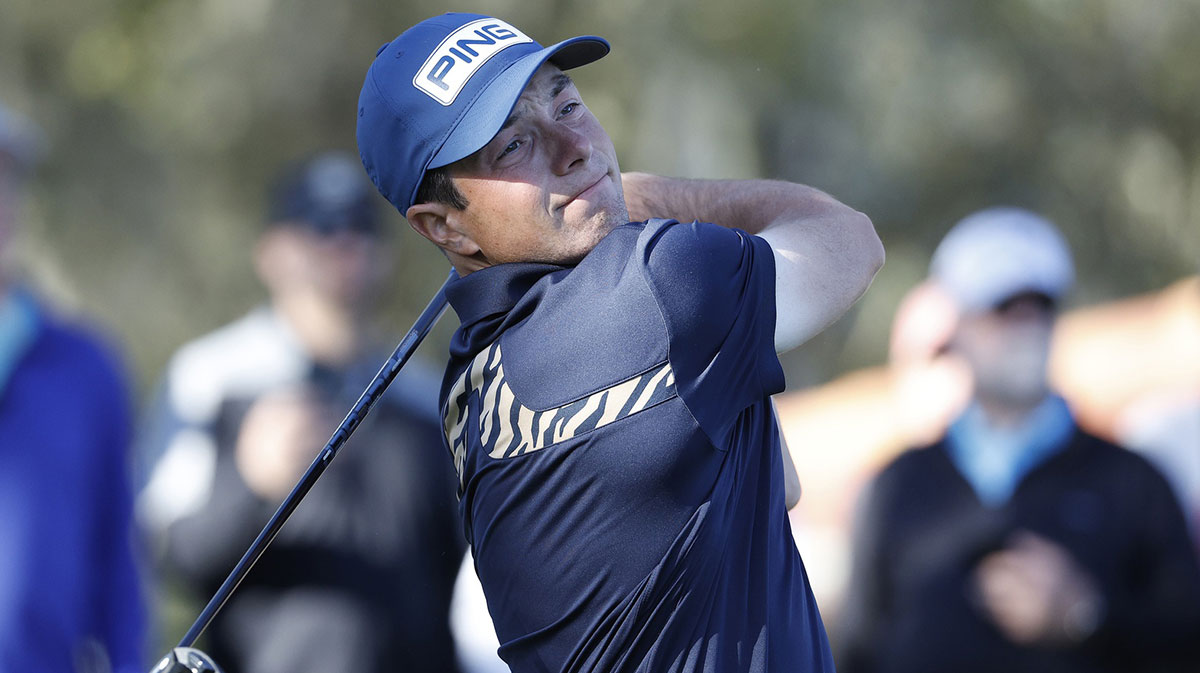 Viktor Hovland hits off of the tee on twelve during the first round of The Players Championship golf tournament at TPC Sawgrass