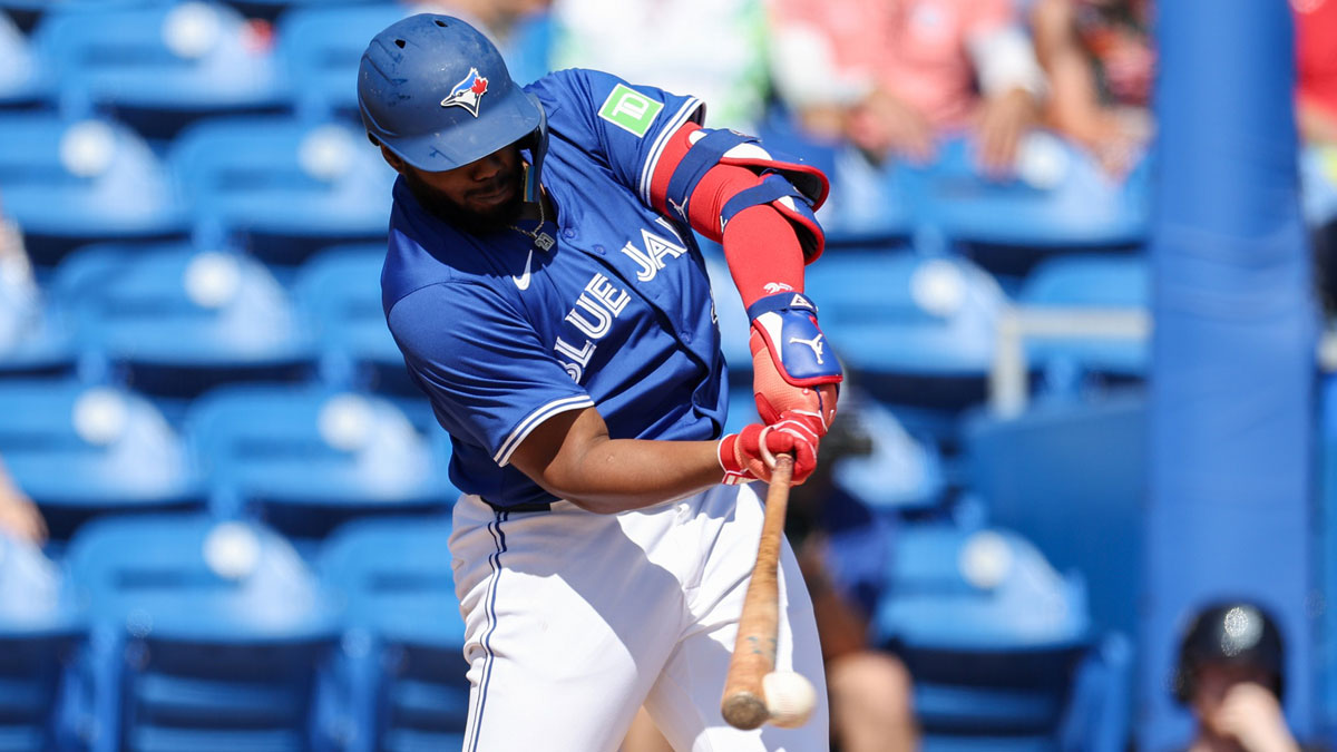 Toronto Blue Jays first base Vladimir Guerrero Jr. (27) hits a base hit against the Detroit Tigers in the fourth inning during spring training at TD Ballpark