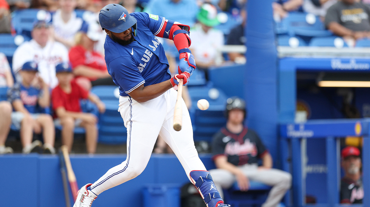 Toronto Blue Jays first baseman Vladimir Guerrero Jr. (27) breaks his bat on a ground ball against the Atlanta Braves in the fifth inning during spring training at TD Ballpark.