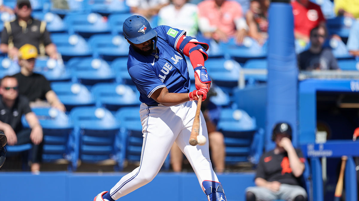 Toronto Blue Jays first base Vladimir Guerrero Jr. (27) hits a base hit against the Detroit Tigers in the fourth inning during spring training at TD Ballpark. 