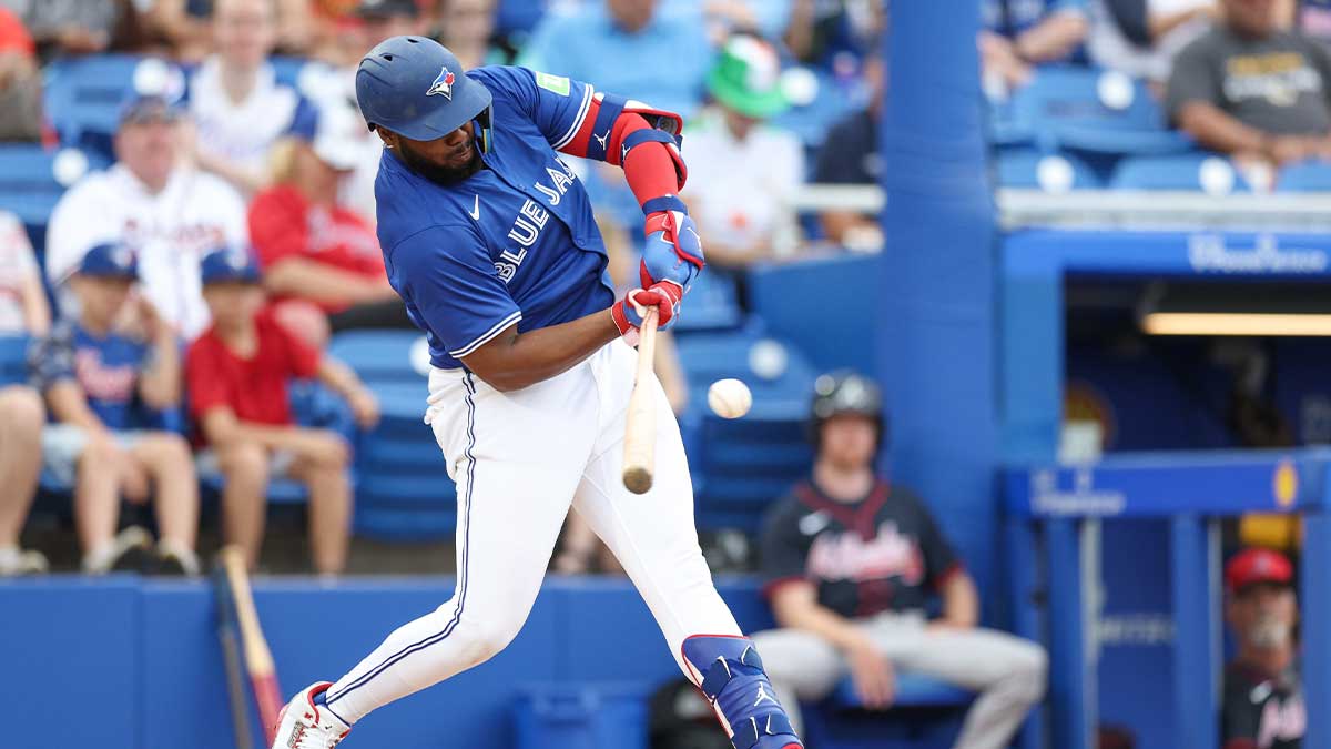 Mar 16, 2025; Dunedin, Florida, USA; Toronto Blue Jays first baseman Vladimir Guerrero Jr. (27) breaks his bat on a ground ball against the Atlanta Braves in the fifth inning during spring training at TD Ballpark. 