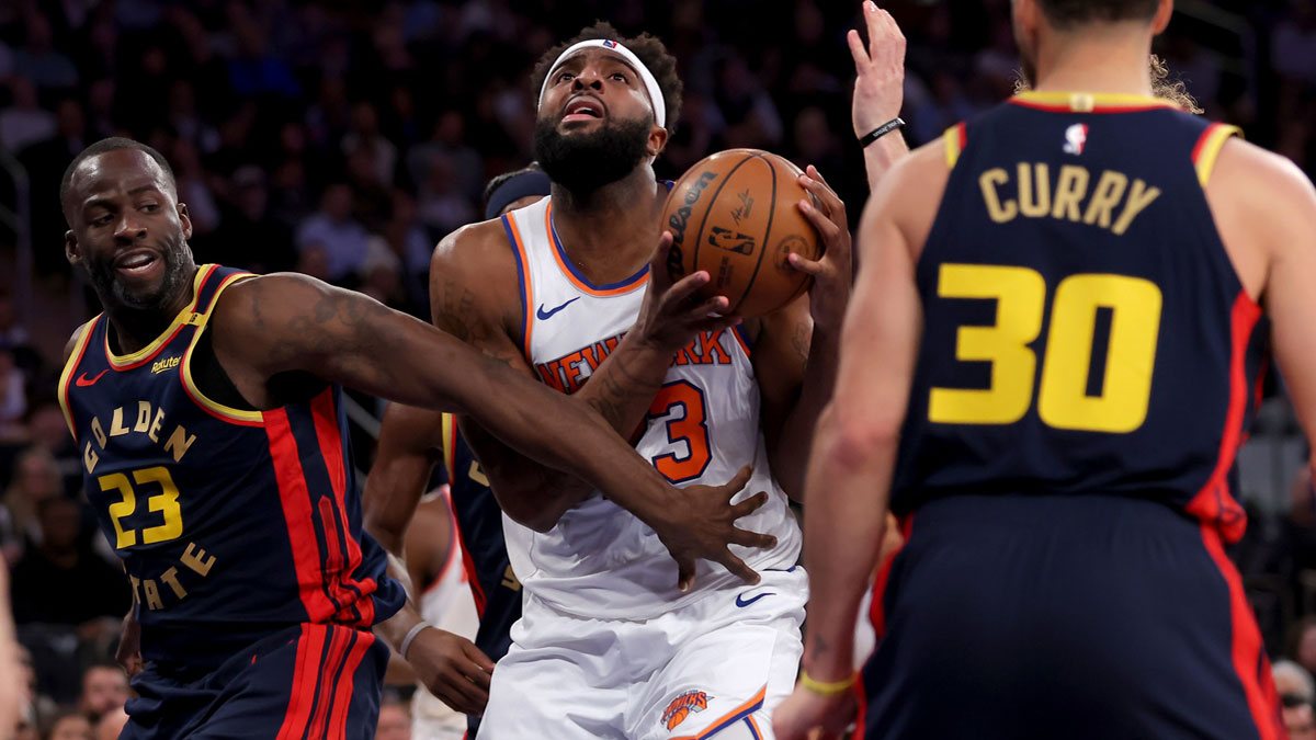 Warriors forward Draymond Green (23) and guards Brandin Podziemski (2) and Stephen Curry (30) during the third quarter at Madison Square Garden