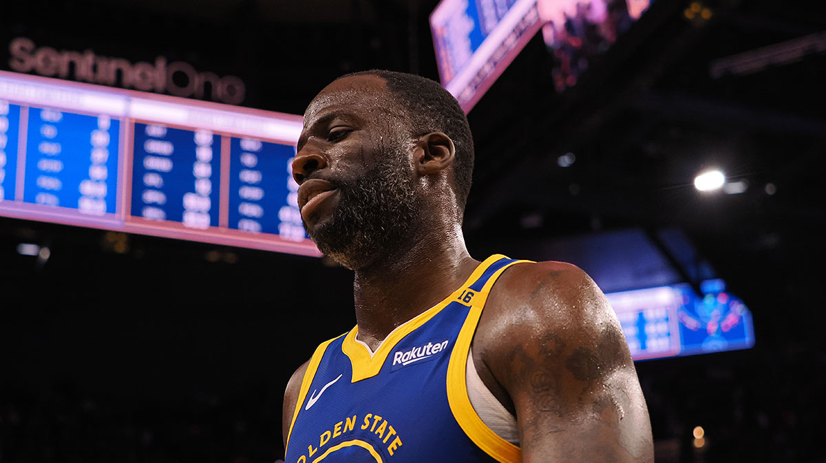 Warriors forward Draymond Green (23) walks off the court with time remaining during the final seconds of the fourth quarter against the Denver Nuggets at Chase Center