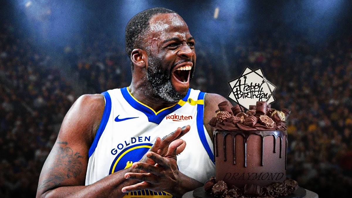 Warriors' Draymond Green with a birthday cake next to him