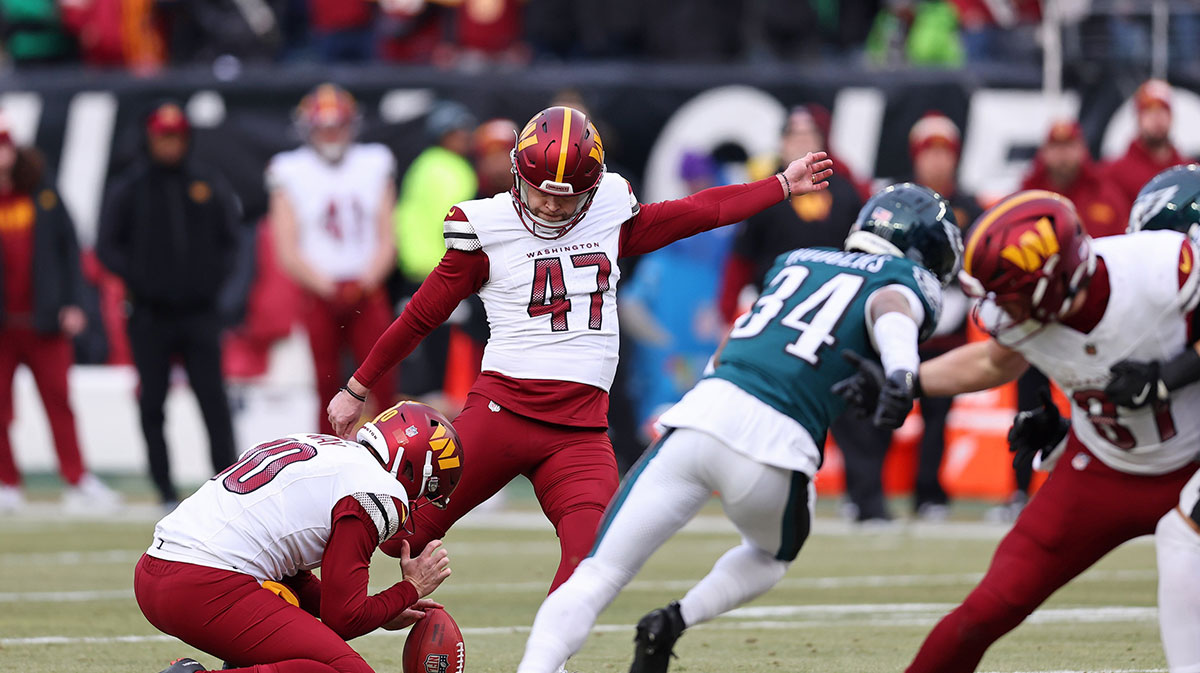 Washington Commanders place kicker Zane Gonzalez (47) kicks a field goal against the Philadelphia Eagles during the first half of the NFC Championship game at Lincoln Financial Field.