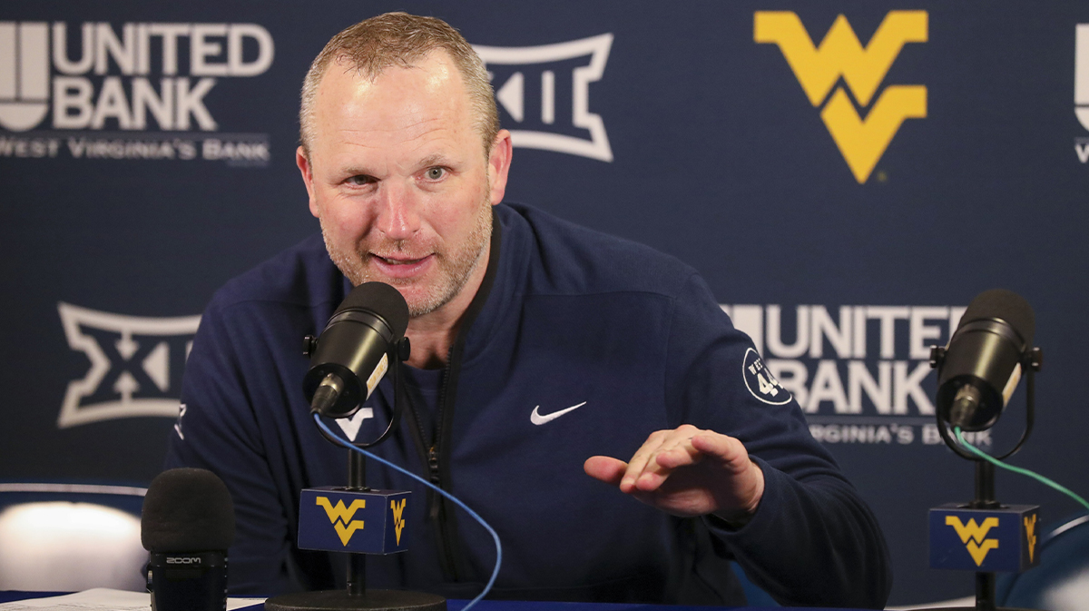 West Virginia Mountaineers head coach Darian DeVries answers questions from the media after defeating the UCF Knights at WVU Coliseum.