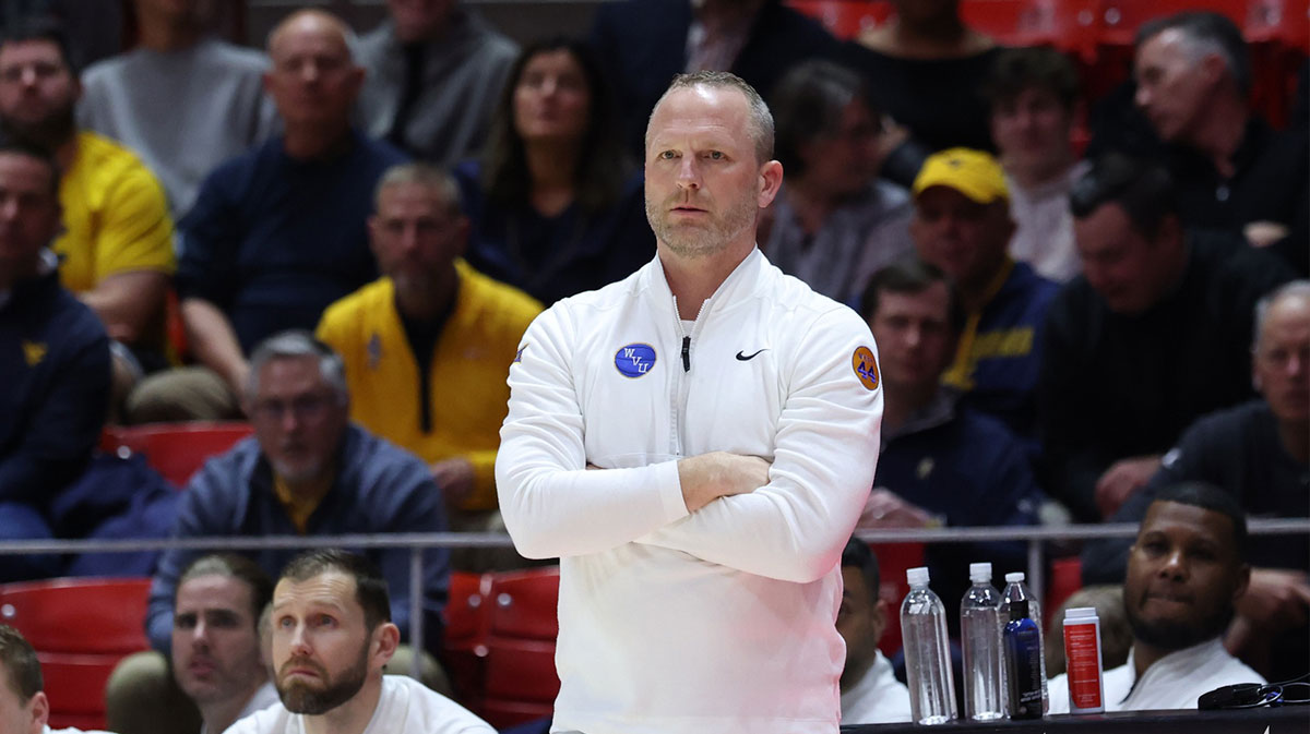 Iowa basketball’s link to West Virginia head coach gets doused in cold water