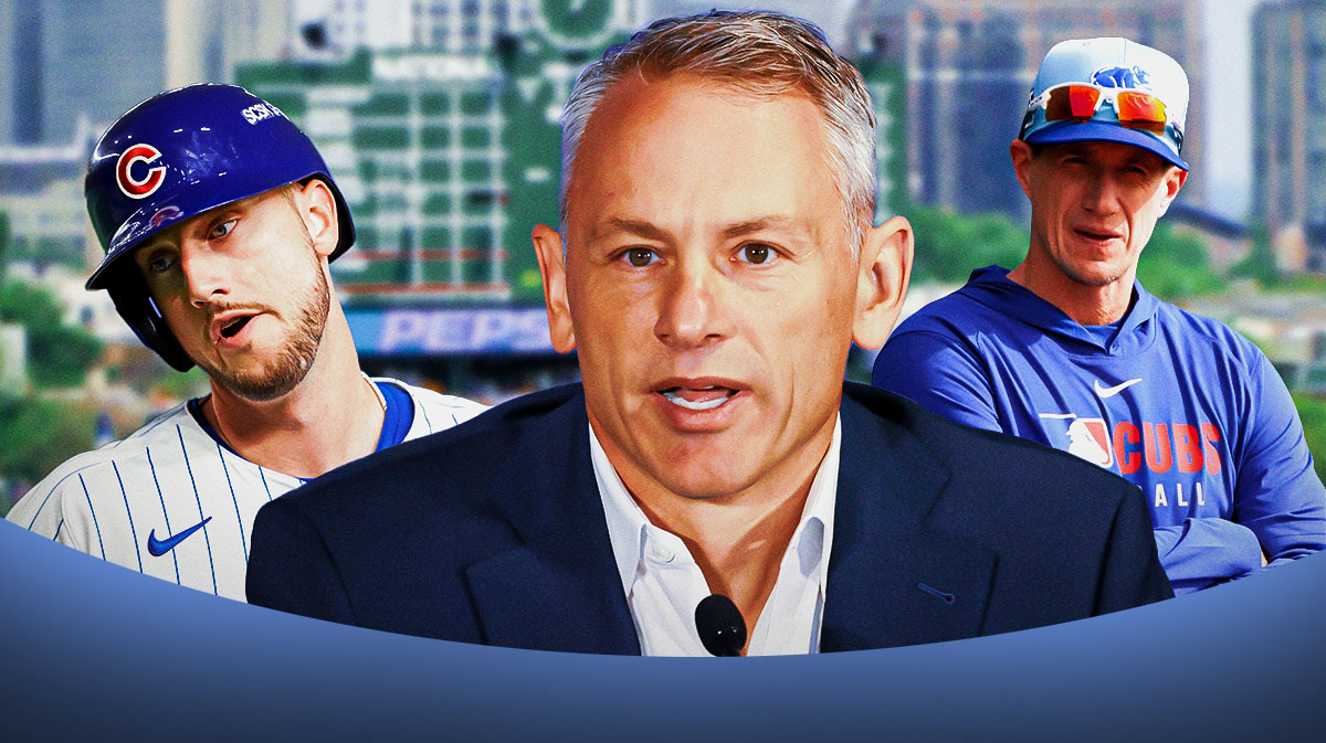 Chicago Cubs executive Jed Hoyer in the middle with Kyle Tucker and Craig Counsell in front of Wrigely. Field.