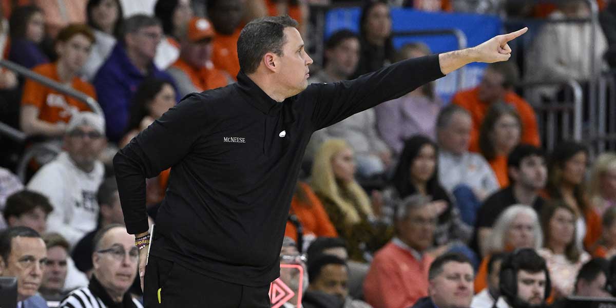 McNeese State Cowboys head coach Will Wade signals to his players during the second half against the Clemson Tigers at Amica Mutual Pavilion.