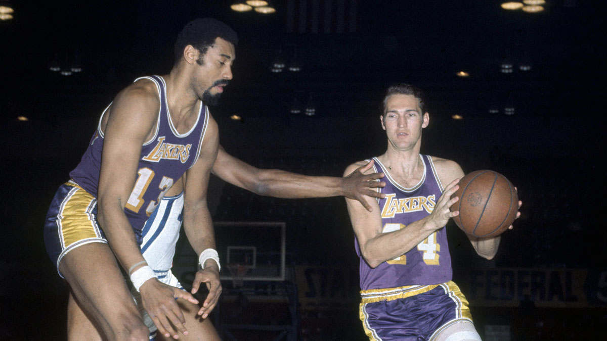 Los Angeles Lakers Guard (44) Jerry West comes from the Stegl Center (13) Vilt Chamberlain screen against Cincinnati Royalty in Cincinnati Gardens.