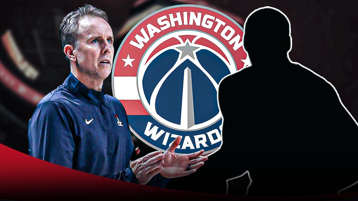 Wizards head coach Brian Keefe looking happy. A silhouette of a basketball player next to him. Washington Wizards logo in between Keefe and the silhouette