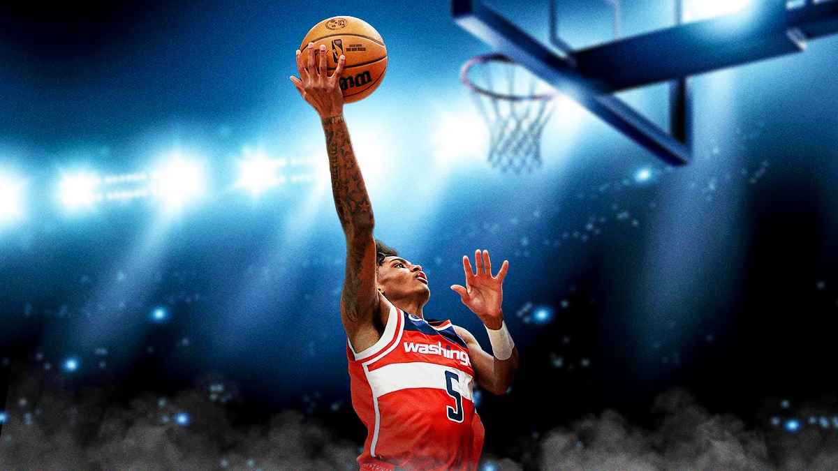 AJ Johnson dunks basketball
