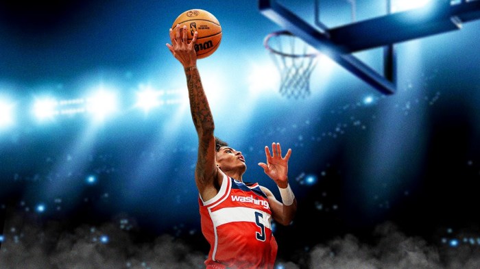 AJ Johnson dunks basketball