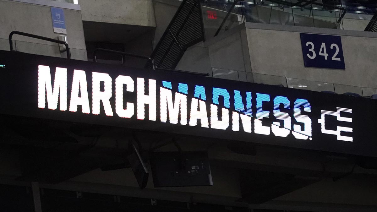 March Madness signs are displayed ahead of the 2025 NCAA Men’s Basketball Midwest Regional at Lucas Oil Stadium