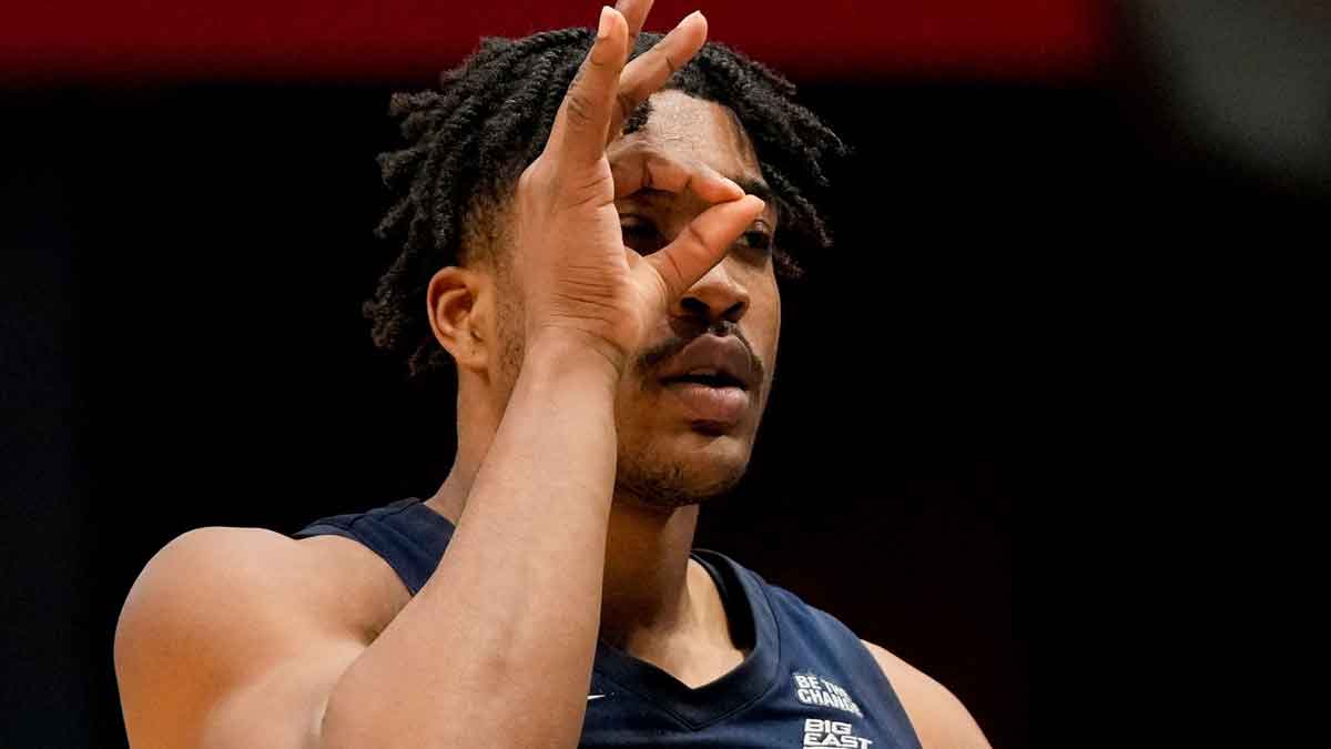 Xavier Musketeers guard Marcus Foster (1) celebrates a three point basket in the second half of the NCAA Tournament First Four game between the Xavier Musketeers and the Texas Longhorns at University of Dayton Arena in Dayton, Ohio, on Wednesday, March 19, 2025. Xavier advances with an 86-80 win over Texas, moving on to play Illinois in the first round.