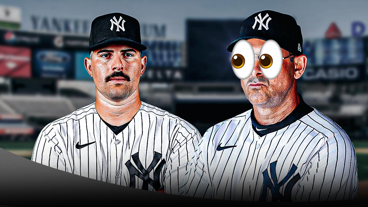 Yankees manager Aaron Boone with big cartoon eyes looking at Carlos Rodon in a Yankees uniform as rodon avoided becoming latest yankees injury.