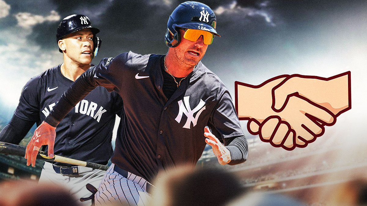 Yankees' Cody Bellinger standing next to Aaron Judge with the handshake emoji