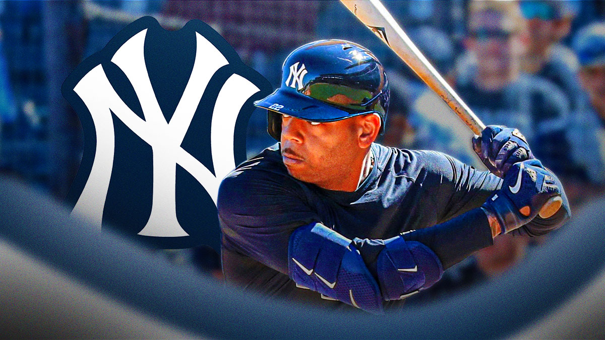 Dominic Smith batting, Yankees logo in background