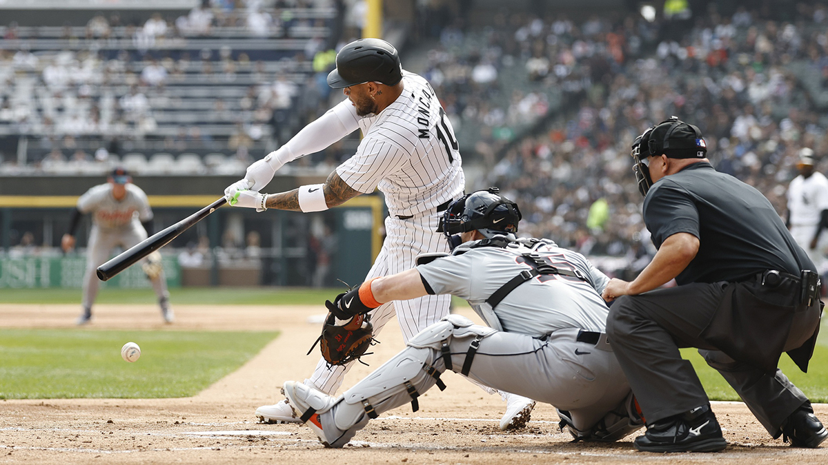 Chicago White Sox third baseman Yoan Moncada (10) singles against the Detroit Tigers during the first inning at Guaranteed Rate Field. 