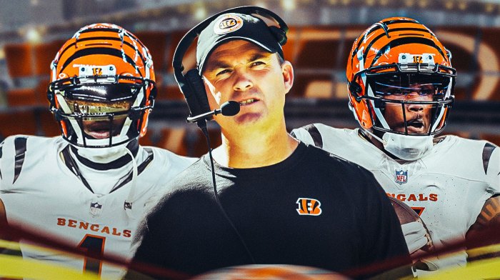 Cincinnati coach Zac Taylor with Ja'Marr Chase in a Bengals uniform and Tee Higgins in a Bengals uniform as the bengals re-signed chase and higgins to new contracts.