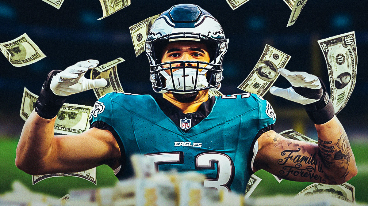 Zack Baun with money falling around him