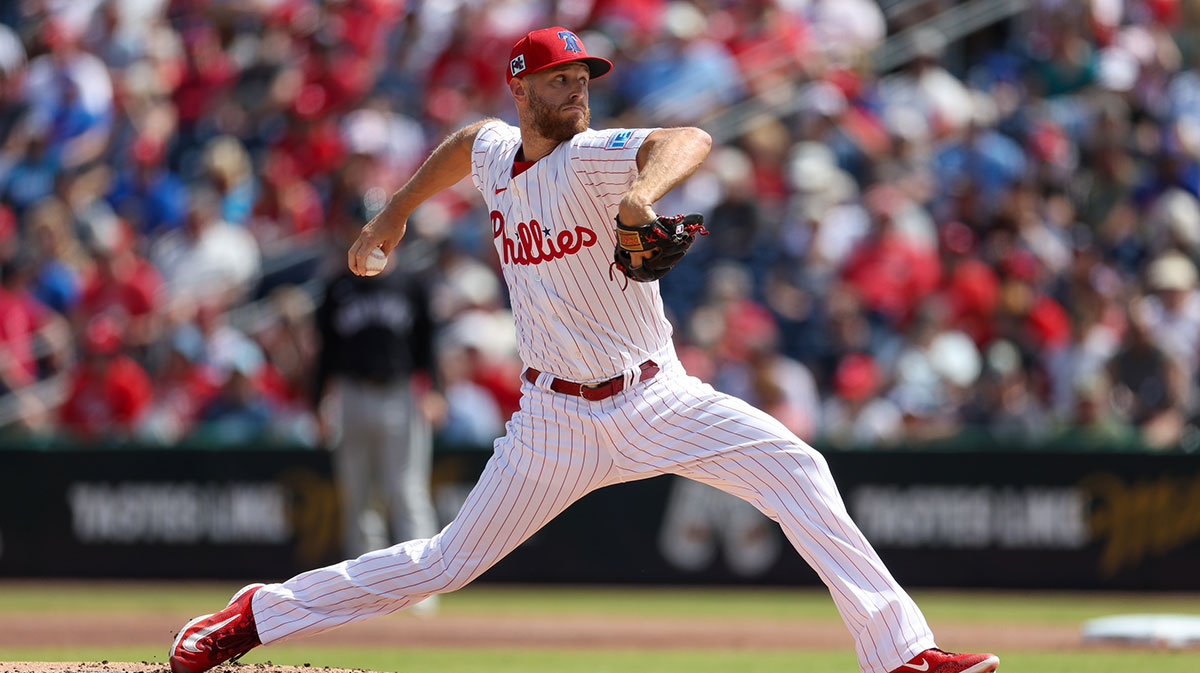 Mar 4, 2025; Clearwater, Florida, USA; Philadelphia Phillies pitcher Zack Wheeler (45) throws a pitch against the New York Yankees in the first inning during spring training at BayCare Ballpark. 