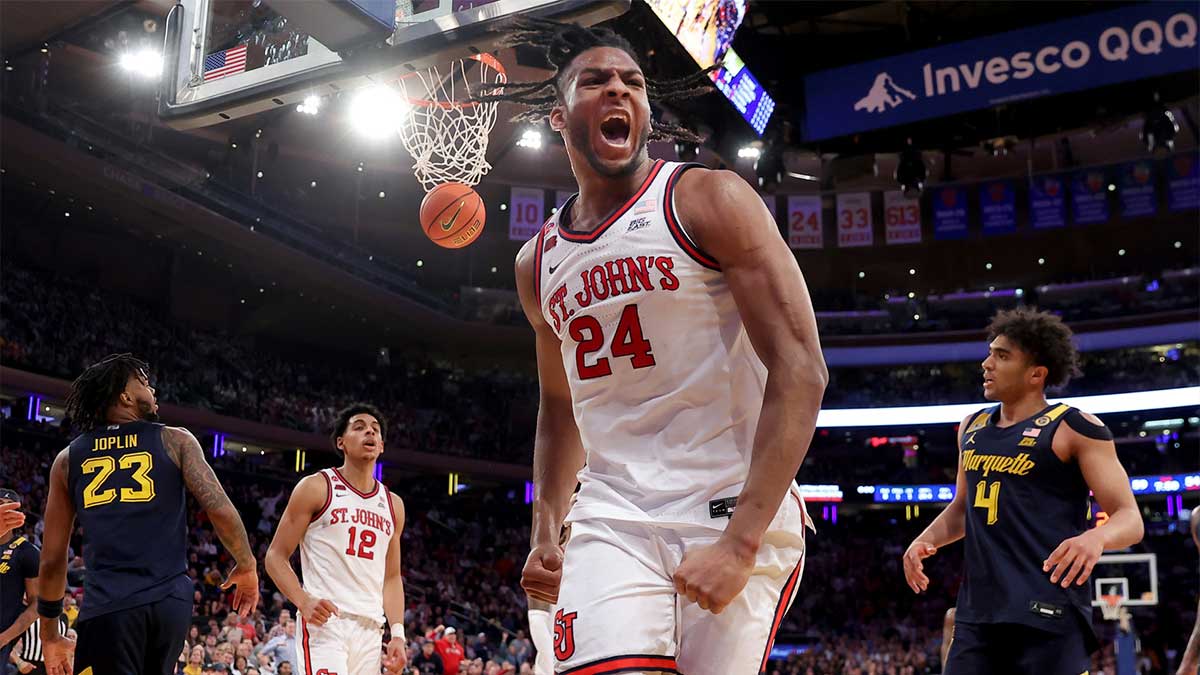 Mar 14, 2025; New York, NY, USA; St. John's Red Storm forward Zuby Ejiofor (24) reacts after a basket and a foul during the second half against the Marquette Golden Eagles at Madison Square Garden.