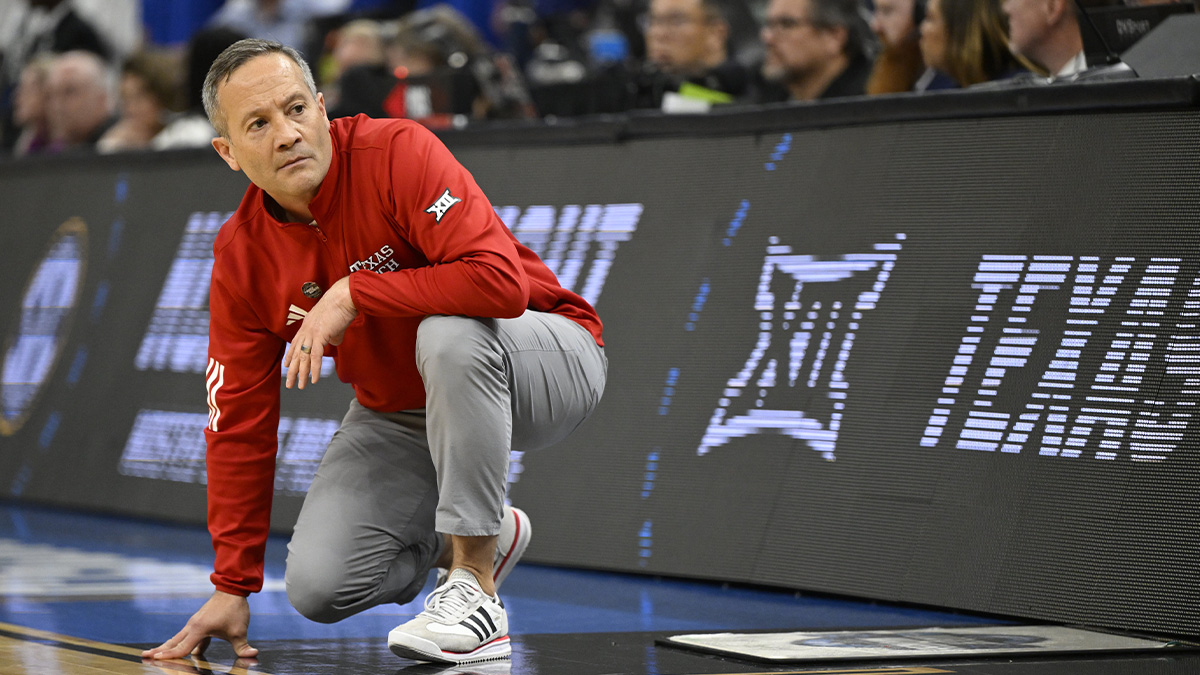 Texas Tech Red Raiders head coach Grant McCasland kneels on the court during the second half against the Florida Gators during the West Regional final of the 2025 NCAA tournament at Chase Center.