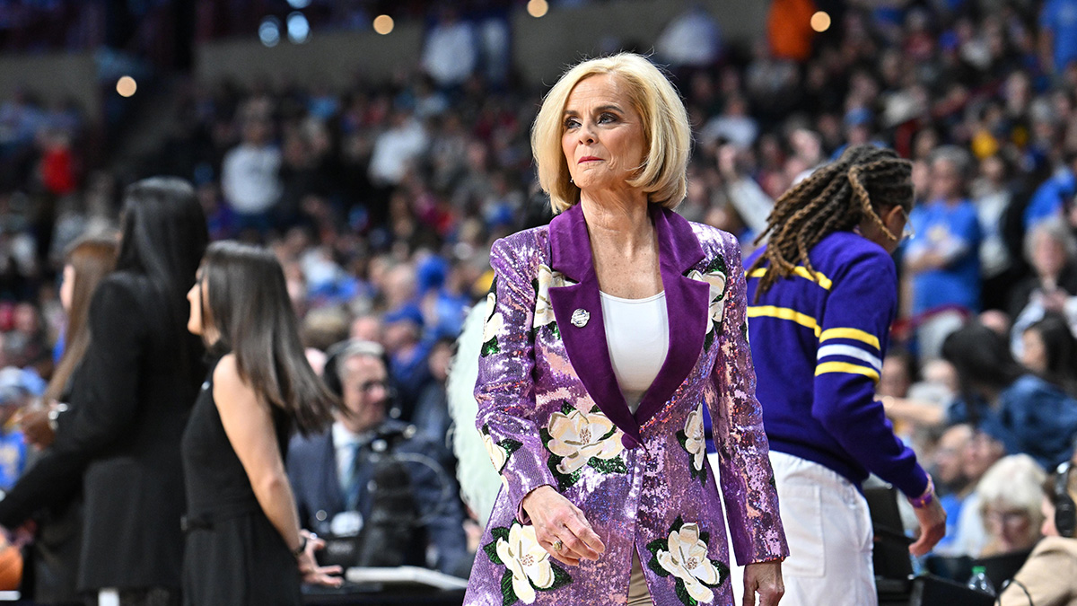 LSU Lady Tigers head coach Kim Mulkey walks the sideline during the first half of a Elite 8 NCAA Tournament basketball game against the UCLA Bruins at Spokane Arena.