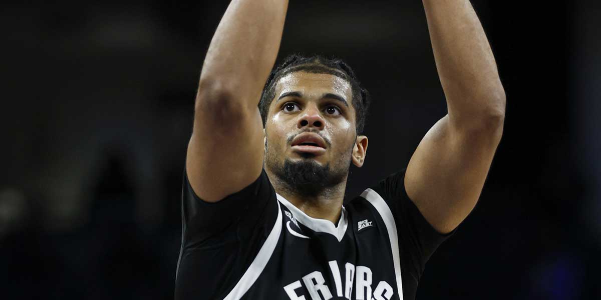 Providence Friars forward Bryce Hopkins (23) shoots a free throw against the DePaul Blue Demons during overtime at Wintrust Arena.