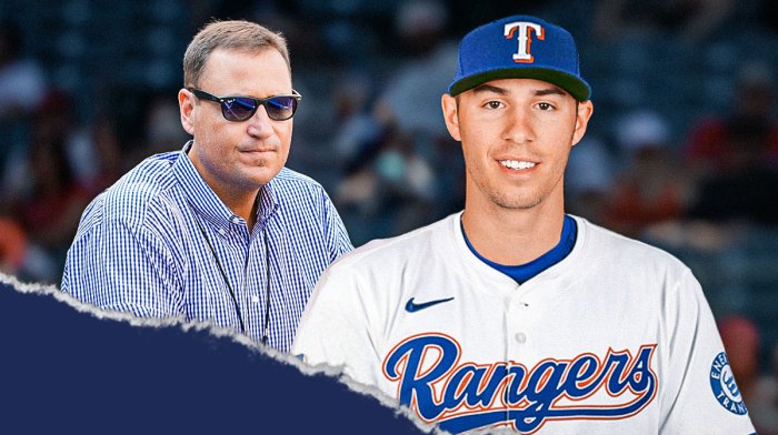 Patrick Corbin in Rangers jersey with Chris Young (Rangers president) in background