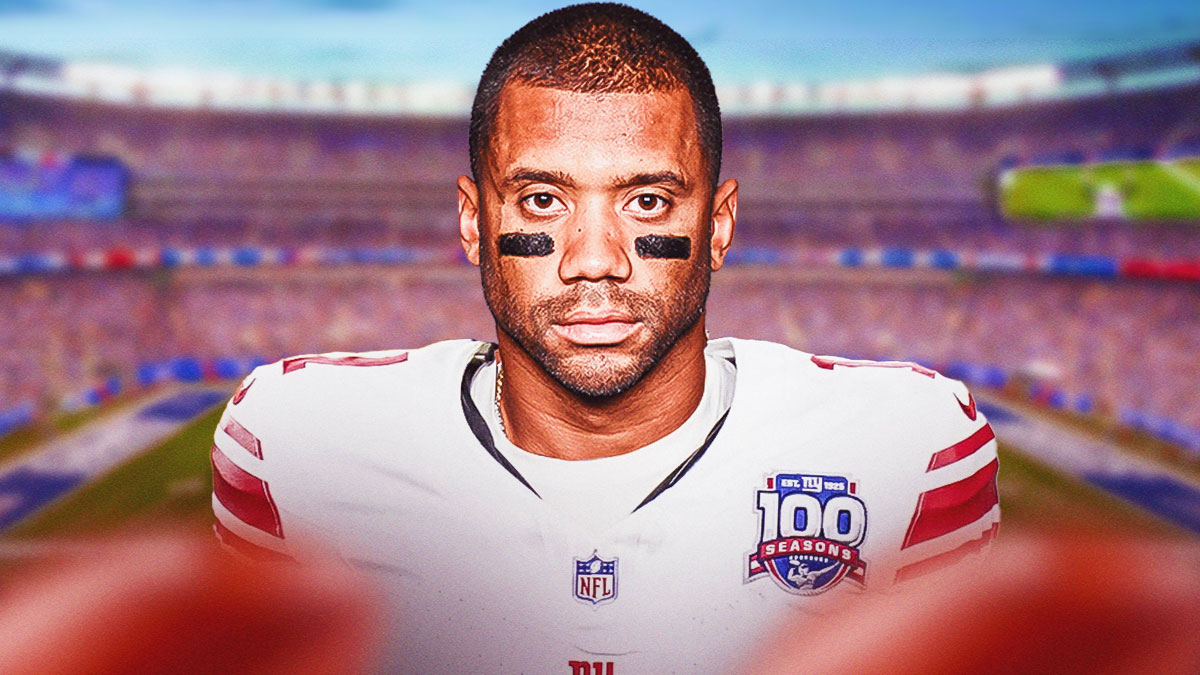 Russell Wilson in a Giants uniform in front of MetLife Stadium.