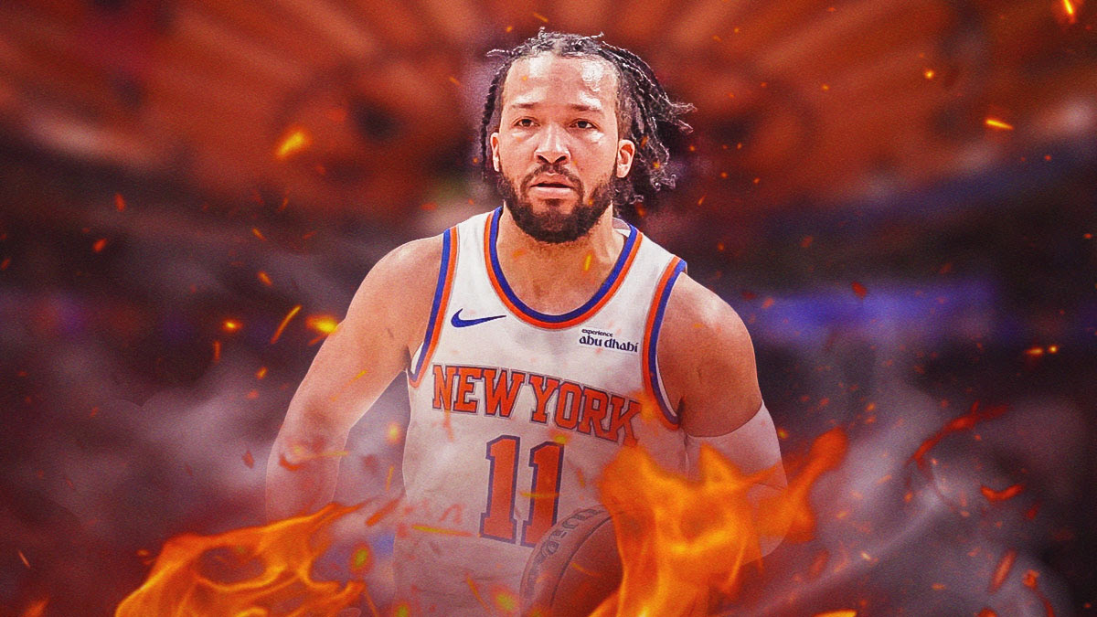 Knicks G Jalen Brunson surrounded by fire