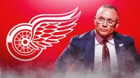 Red Wings Steve Yzerman next to Red Wings logo