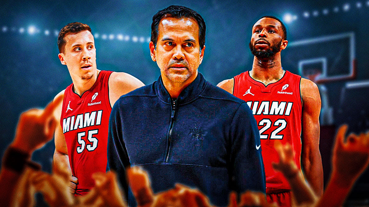 Heat HC Erik Spoelstra next to Andrew Wiggins and Duncan Robinson.