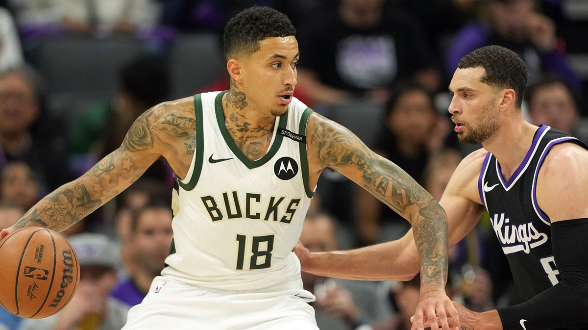 Milwaukee Bucks forward Kyle Kuzma (18) dribbles against Sacramento Kings guard Zach LaVine (right) during the third quarter at Golden 1 Center.