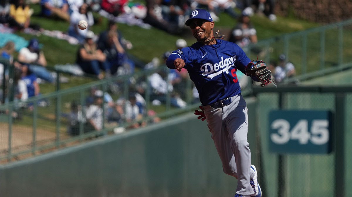 Los Angeles Dodgers shortstop Mookie Betts (50) makes the play against the Chicago White Sox in the third inning at Camelback Ranch-Glendale. 