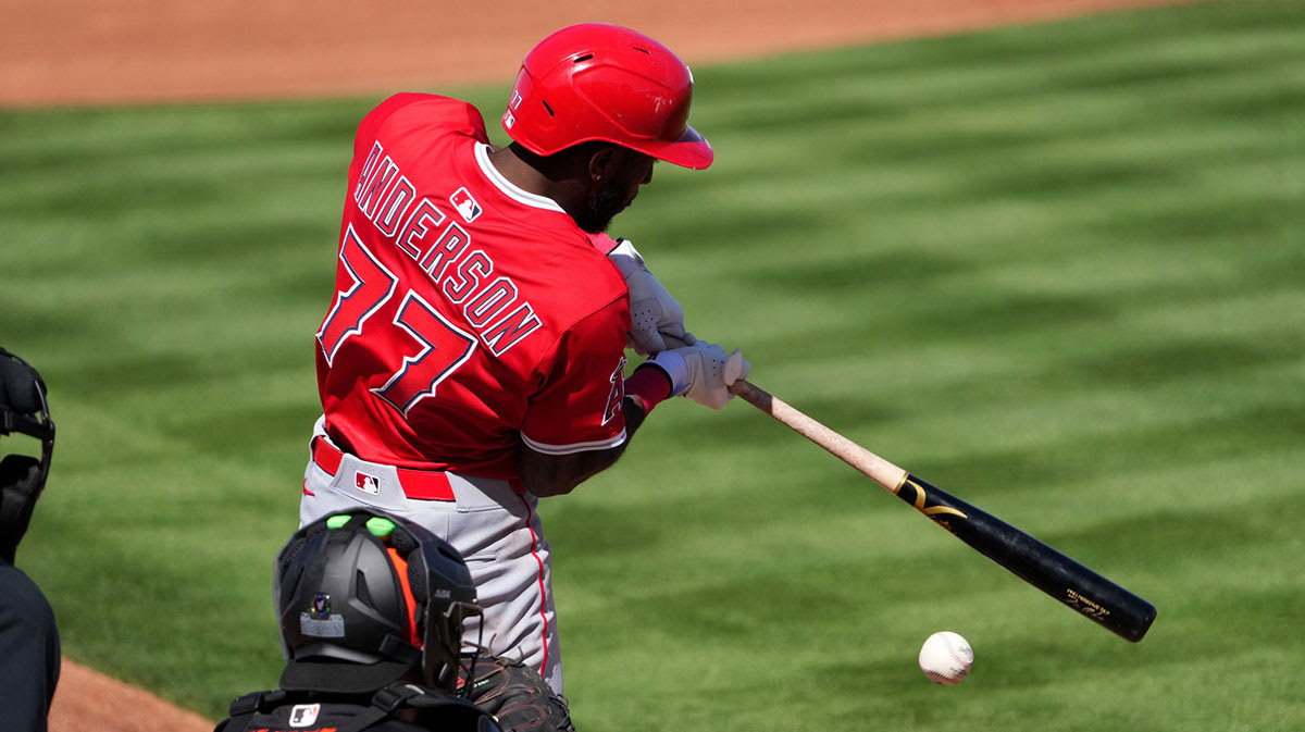 Los Angeles Angels shortstop Tim Anderson bats against the San Francisco Giants during the third inning at Scottsdale Stadium. 