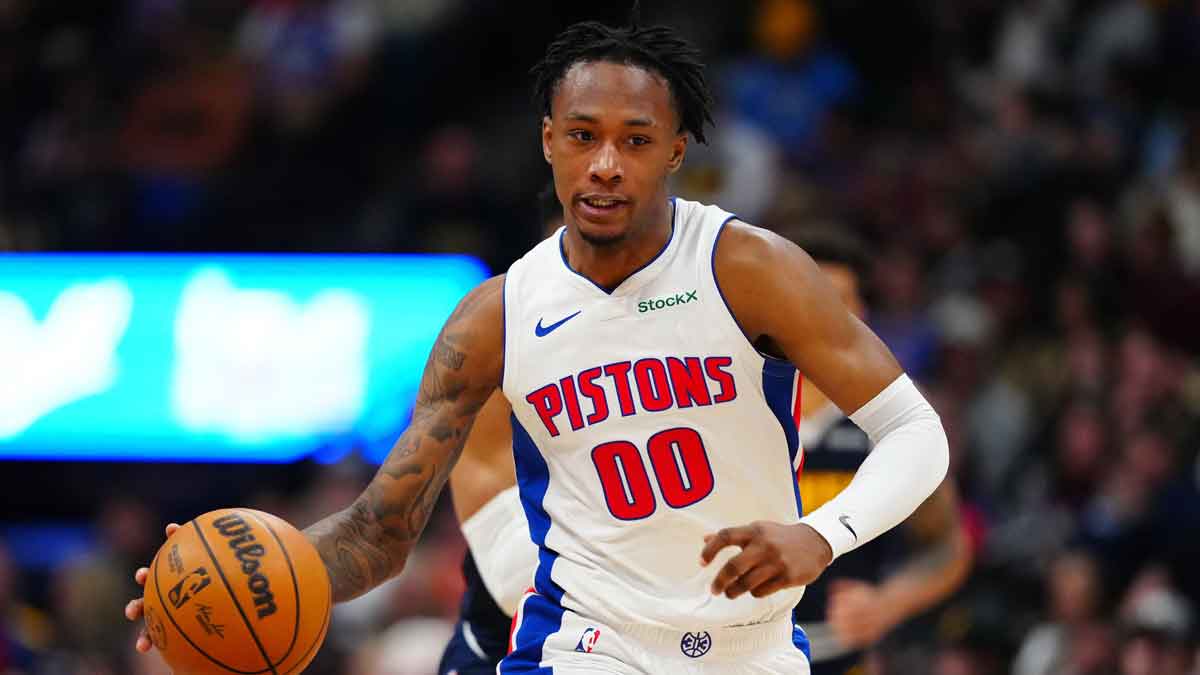 Detroit Pistons forward Ronald Holland II (00) dribbles up court in the second half against the Denver Nuggets at Ball Arena.