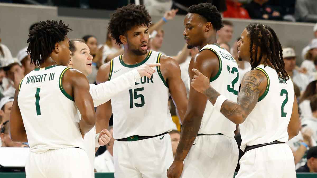 Baylor Bears head coach Scott Drew speaks to his team during the first half against the Houston Cougars at Paul and Alejandra Foster Pavilion.